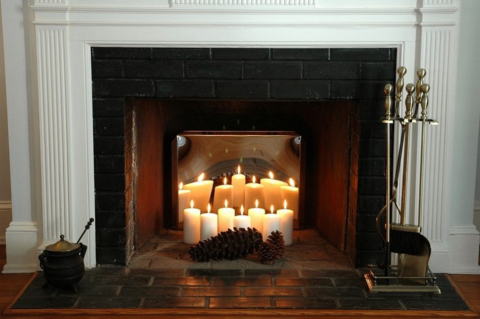 Velas y espejos en decoración.