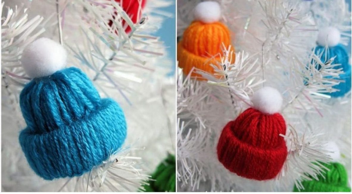 Pom-pom-hattu on yksinkertainen mutta erittäin mukava koriste. Sen tekemiseen tarvitset lankaa, pom-pomia ja liimaa.